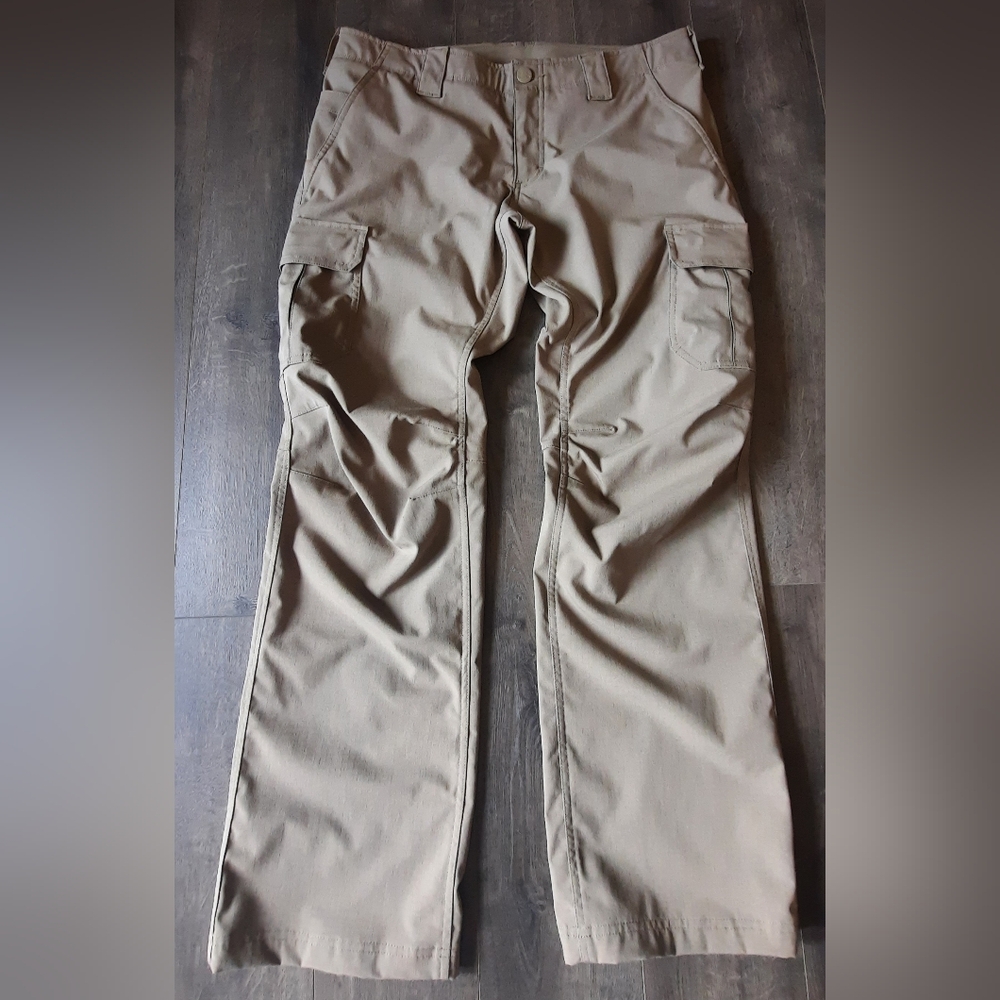Under Armour Storm tactical pants. Coyote Tan. Size 14 reg. New without tags.
